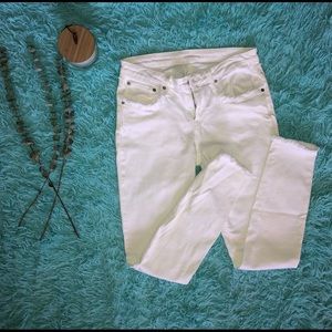 White jeans with distressing detail
